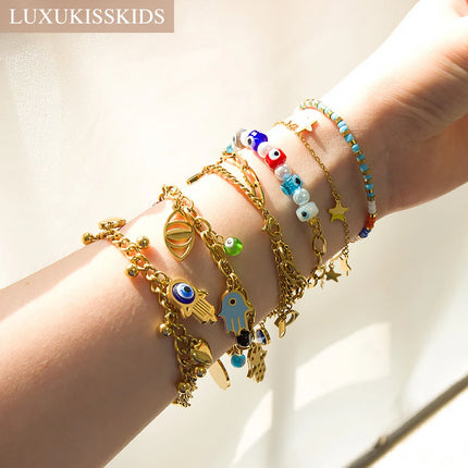 LUXUKISSKIDS Модерни гривни със зли очи за жени от неръждаема стомана, бохо талисмани, магнитни пулсерас, сини бижута, аксесоари с мъниста Y2K