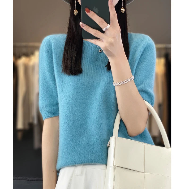 Дамска тениска с къс ръкав, плетена в едноцветен цвят, с петточков маншет, от 100% мериносова вълна, готова за носене