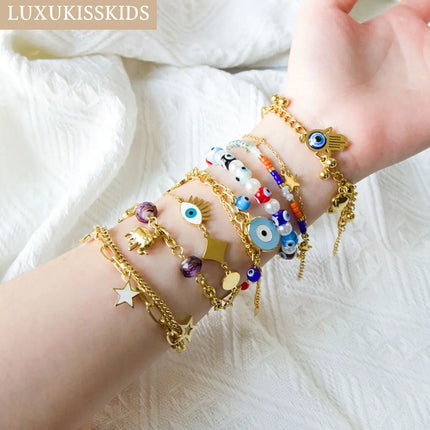 LUXUKISSKIDS Модерни гривни със зли очи за жени от неръждаема стомана, бохо талисмани, магнитни пулсерас, сини бижута, аксесоари с мъниста Y2K